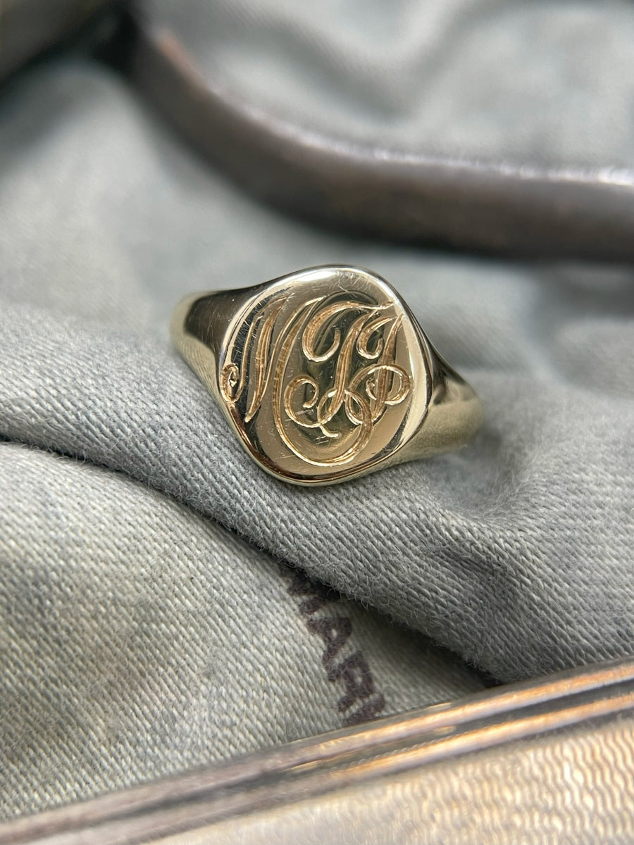 Fine cursive initial